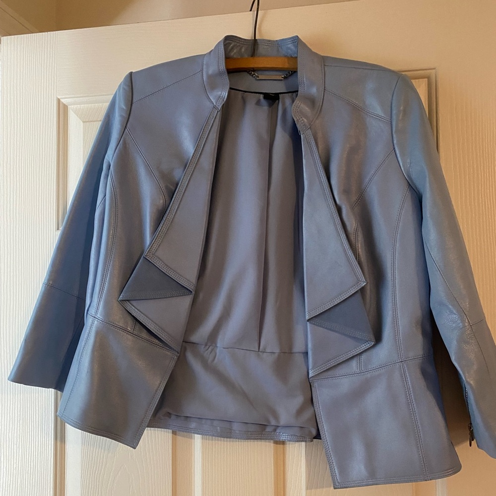 White House Black Market blue leather Peplin jacket, size M.